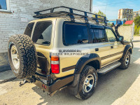 Бампер силовой задний РИФ для Toyota Land Cruiser 80 с квадратом под фаркоп, калиткой и фонарями