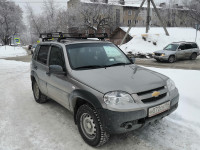 Багажник УНИКАР на штатные места ВАЗ-2123 Chevrolet Niva сварной с боковым ограждением и сеткой