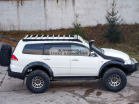 Пороги силовые STC для Mitsubishi Pajero Sport 2008-2015 цельная ступень